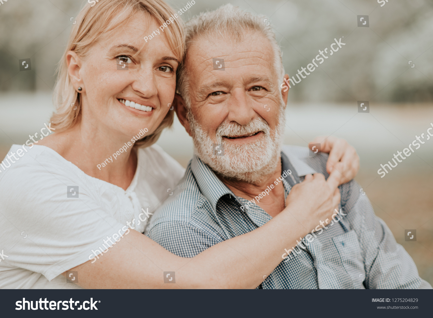 Lifestyle Senior Couple Happy and Relaxed . Good Healthy Elderly in Park Nature. Portrait Senior Retirement, Older Couple Enjoy Vacation Autumn. Celebrated Lover Valentine Day. #1275204829