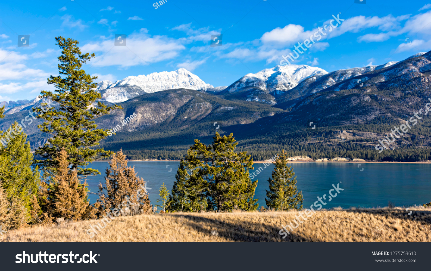 Columbia Lake which is the headwaters of the Columbia River in the East Kootenays near Invermere British Columbia Canada in the early winter #1275753610
