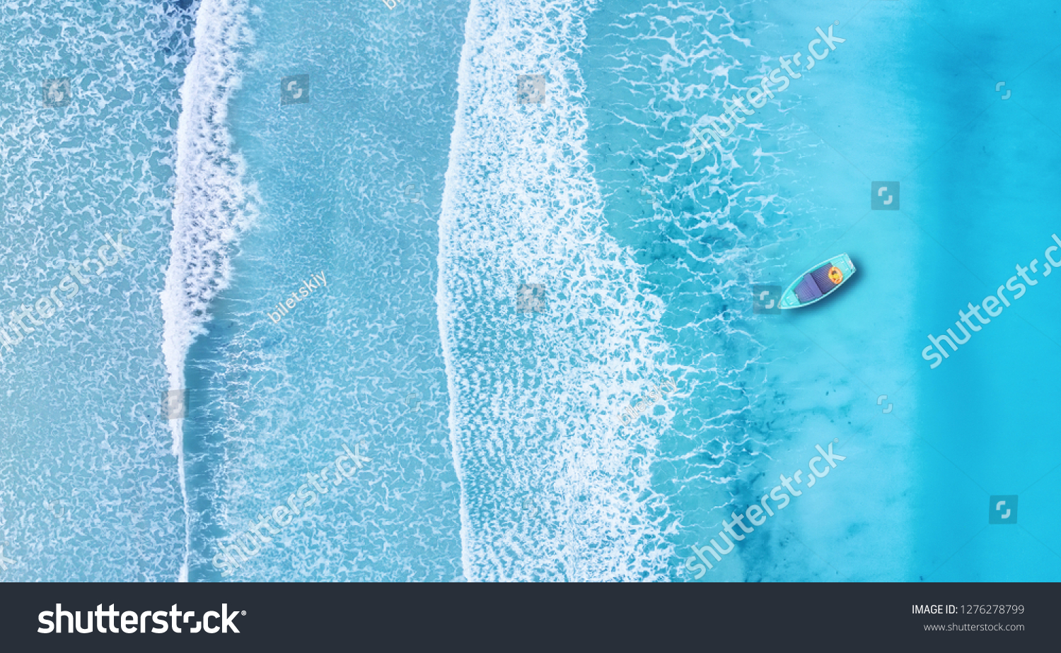 Beach and waves from top view. Turquoise water background from top view. Summer seascape from air. Top view from drone. Travel concept and idea #1276278799