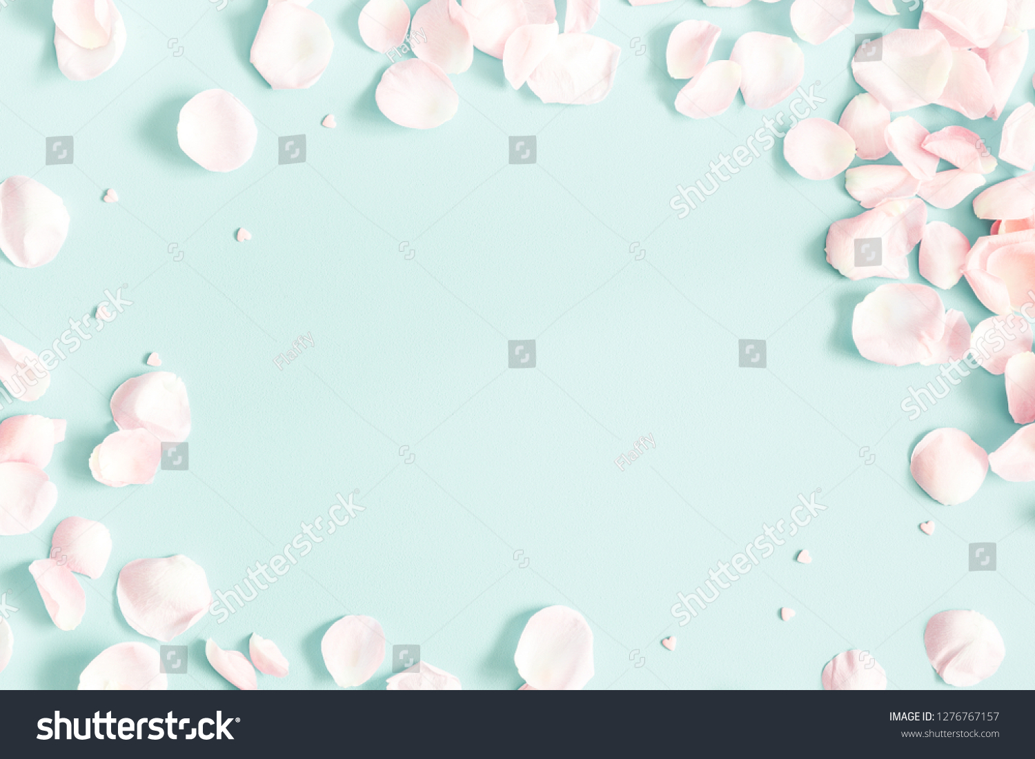 Flowers composition. Rose flower petals on pastel blue background. Valentine's Day, Mother's Day concept. Flat lay, top view, copy space #1276767157