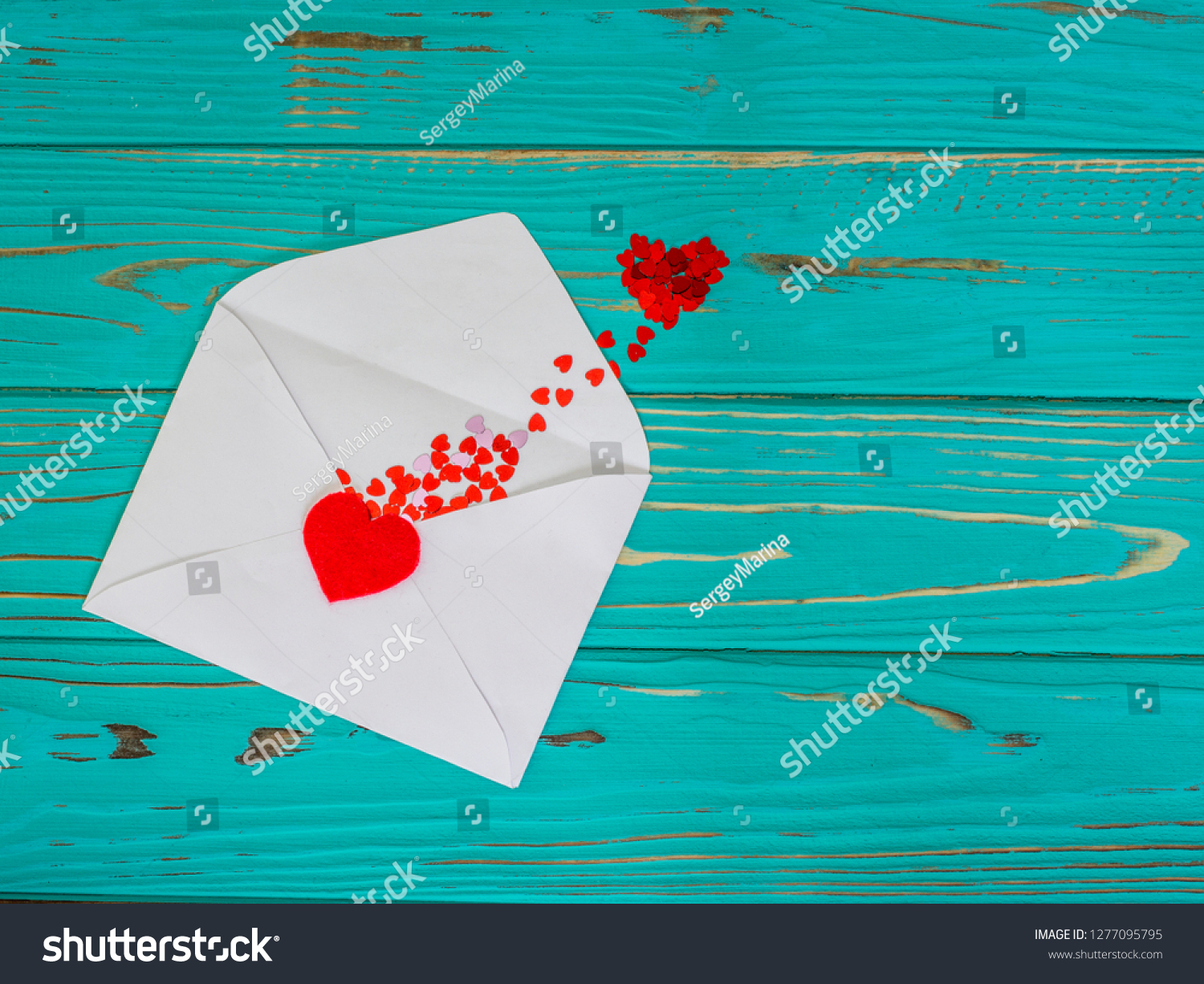 Red heart in love jumped out of envelope on valentines day #1277095795