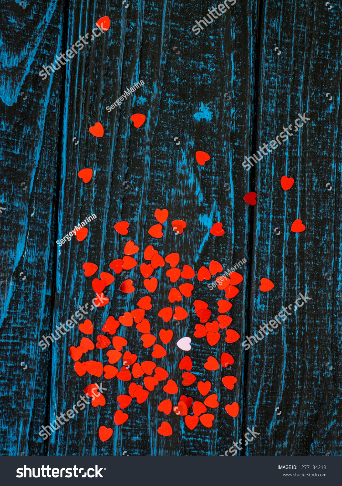 bright red hearts on blue background #1277134213