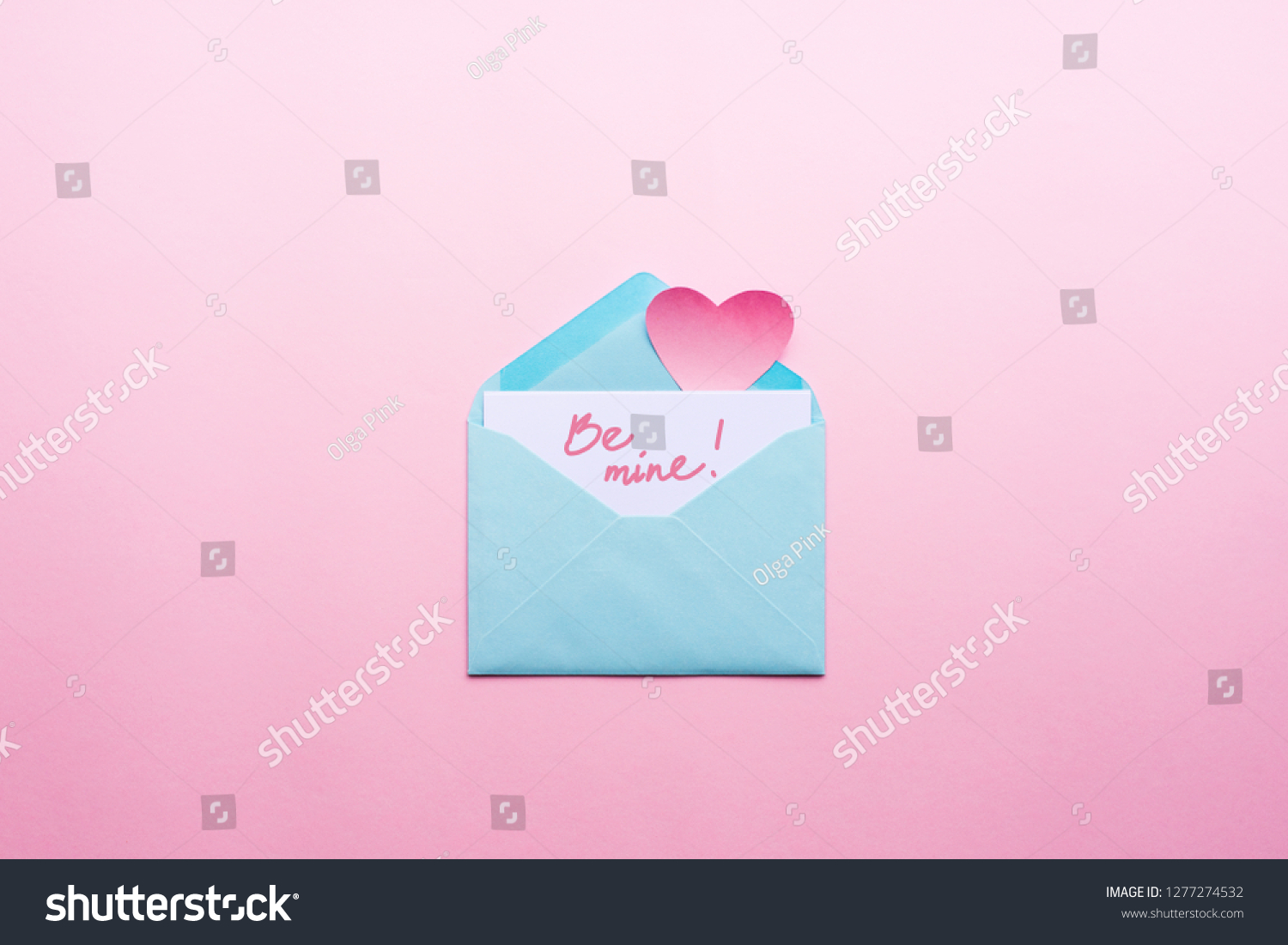 Message Be mine Blue letter with pink heart cartoon style from paper on cardboard background. Valentine day minimal concept Flat lay Top view #1277274532