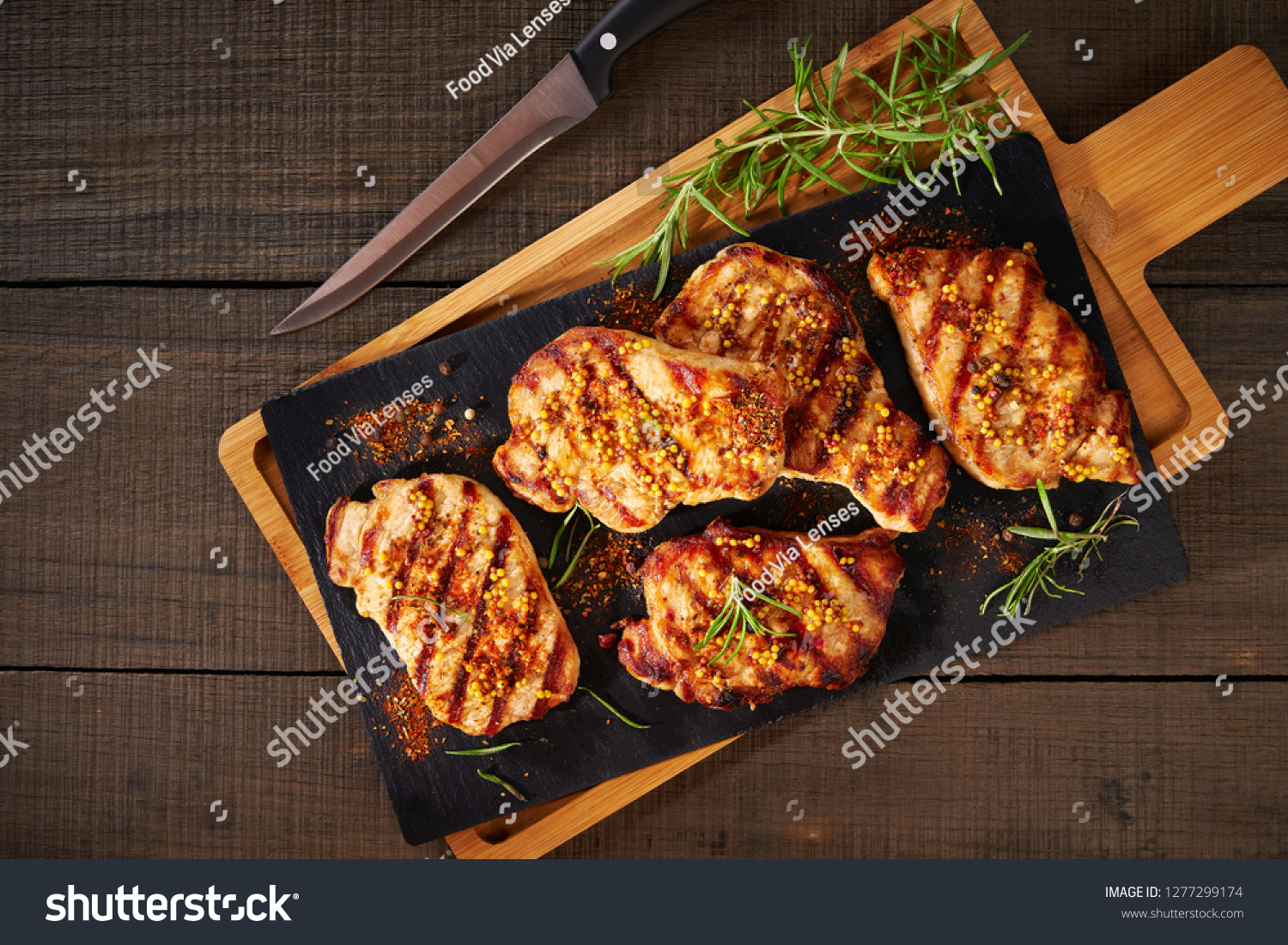 Tender boneless grilled pork chops, top view #1277299174