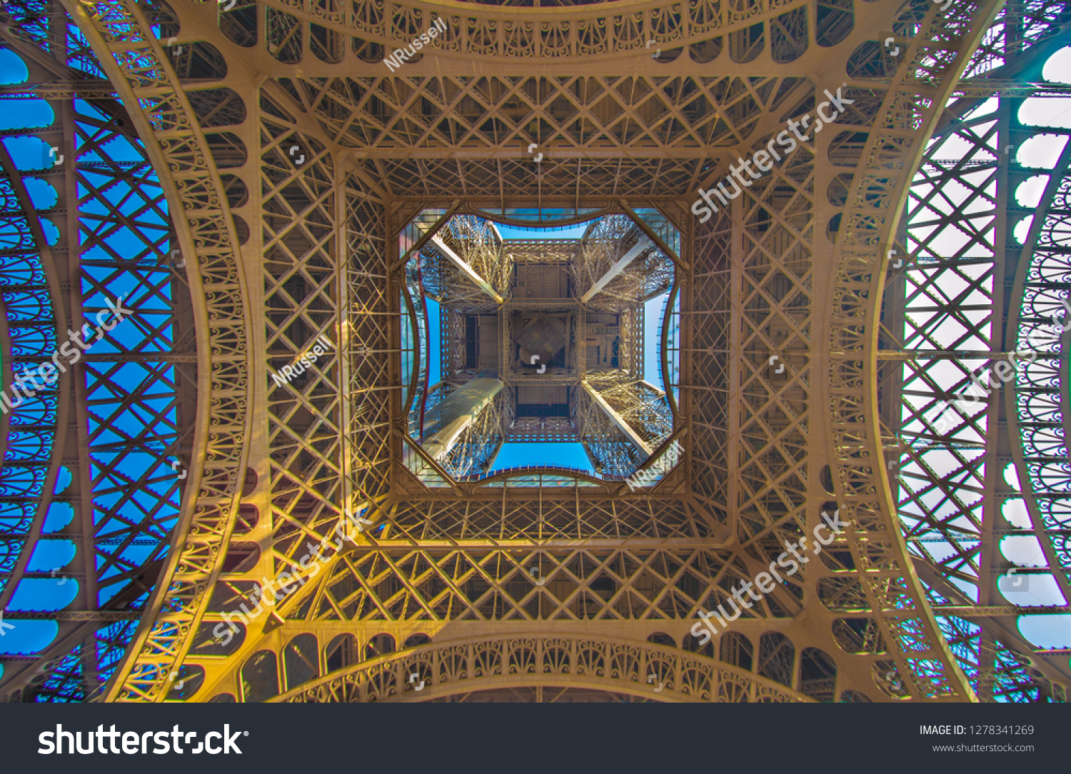 A perspective of the beloved Eiffel tower of Paris France in all its glory and wonder. A landmark that can not be topped by both its history beauty and structural complexity. A art piece for the ages. #1278341269