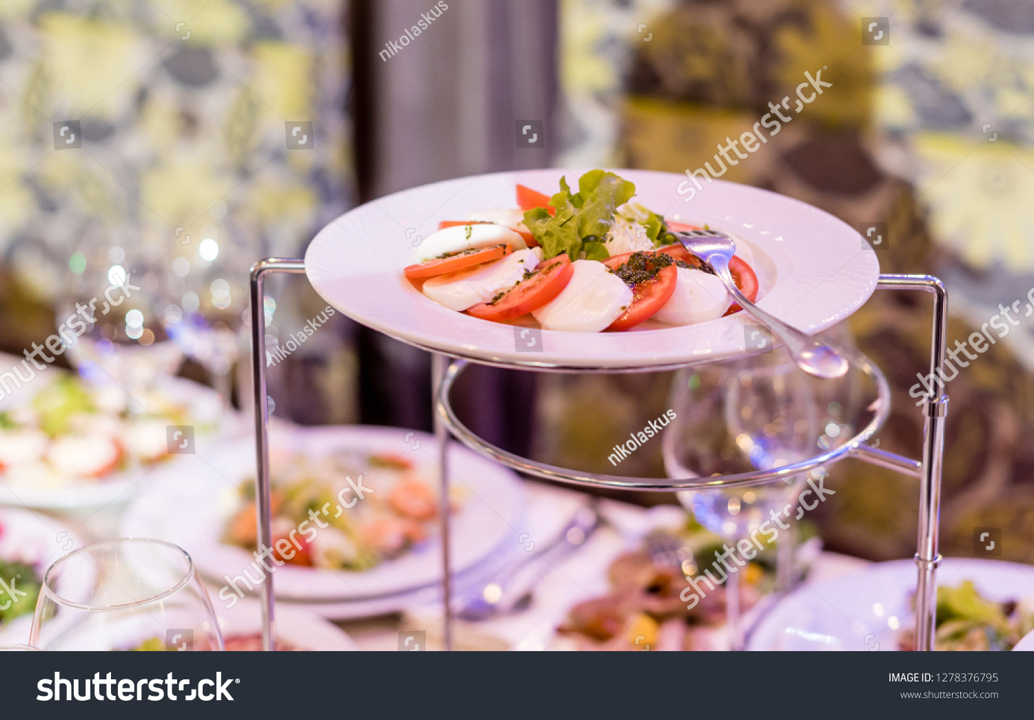 Serving dishes in the restaurant. luxury dinner served on the table #1278376795