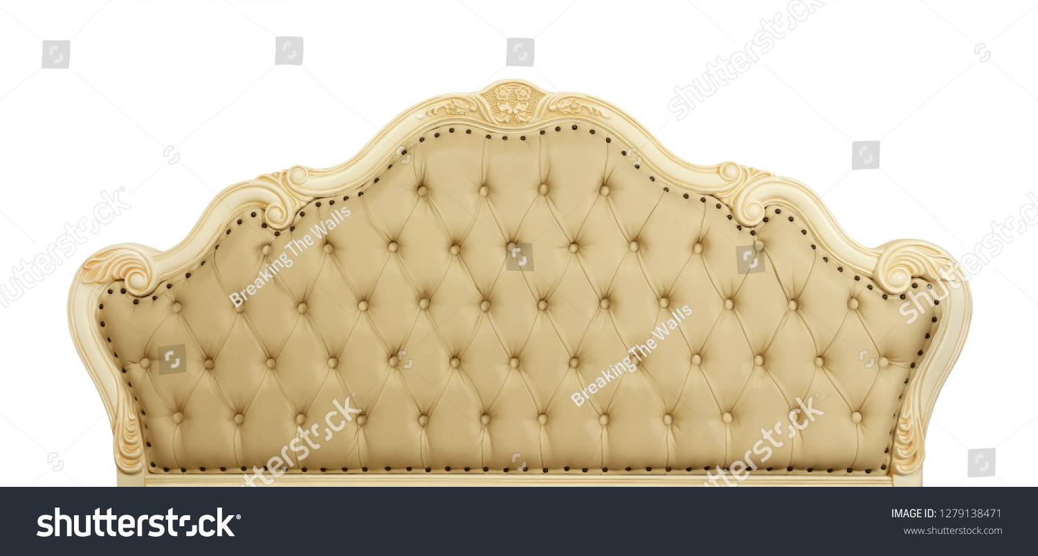 Shaped pastel beige color soft tufted leather capitone bed headboard of Chesterfield style sofa with carved wooden frame, isolated on white background, front view #1279138471