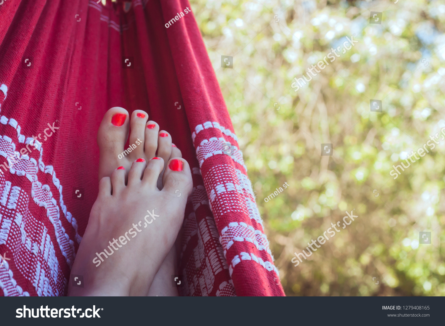  feet resting in hammock #1279408165