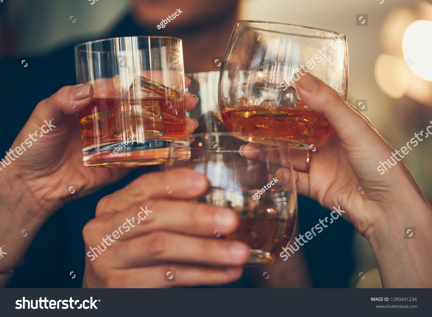 Three people makes a toast with whiskey #1280431234