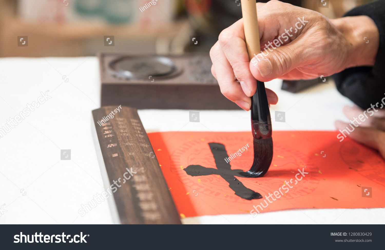 
Chinese New Year calligraphy, the phrase means good luck, wealth, work well, business is booming. #1280830429