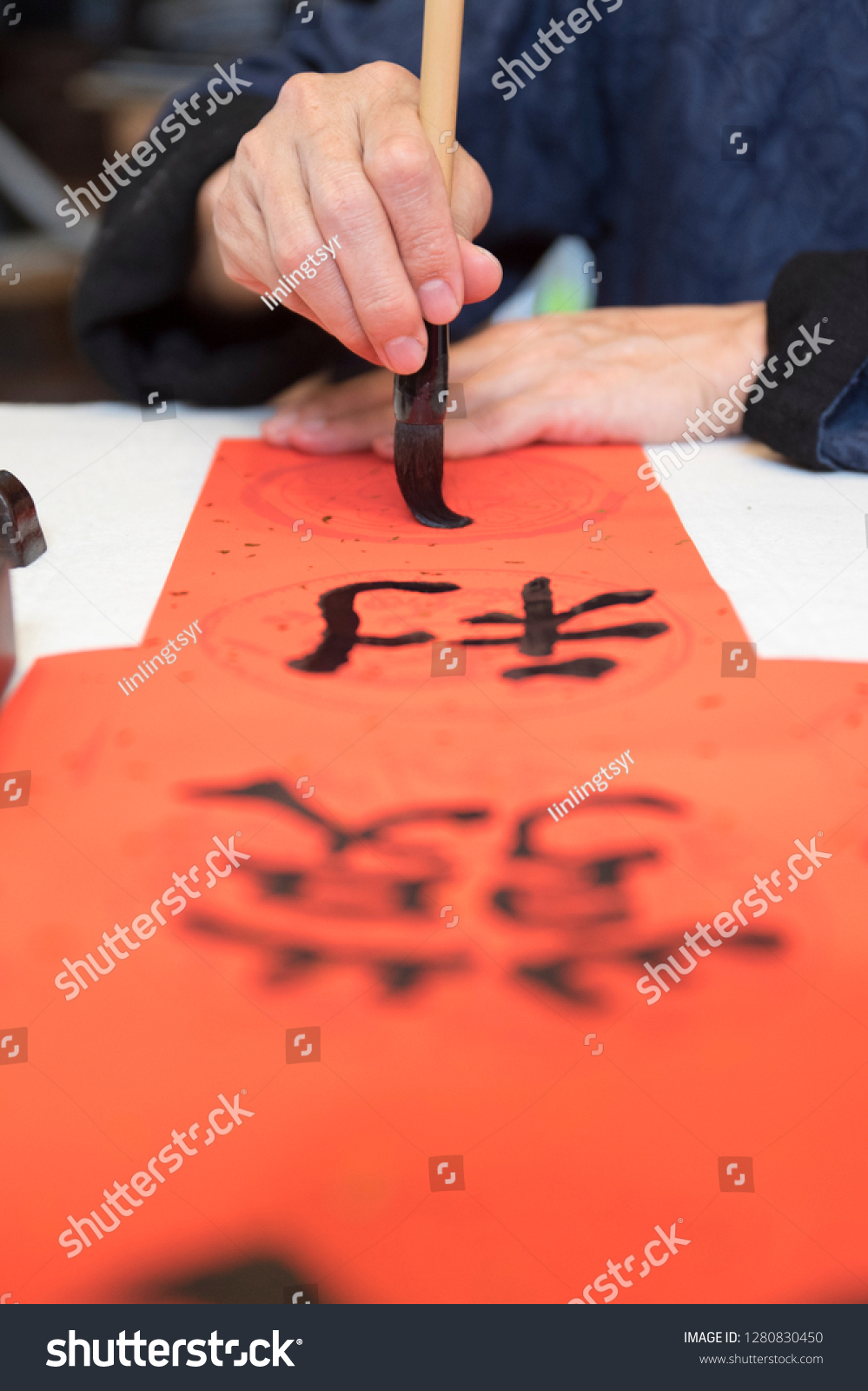 
Chinese New Year calligraphy, the phrase means good luck, wealth, work well, business is booming. #1280830450