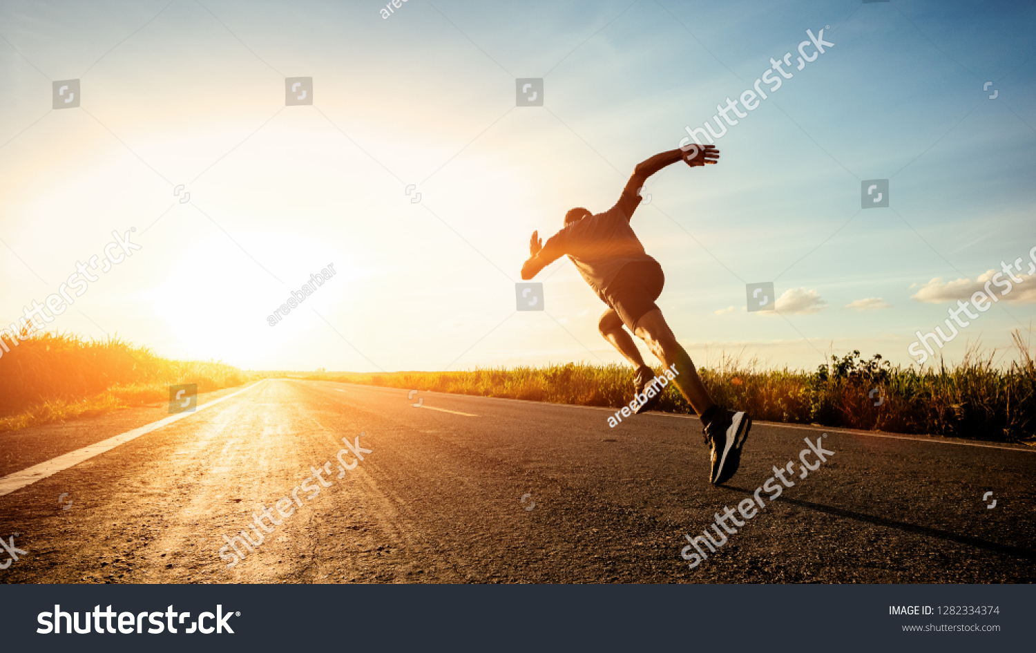 Athlete runner feet running on road #1282334374