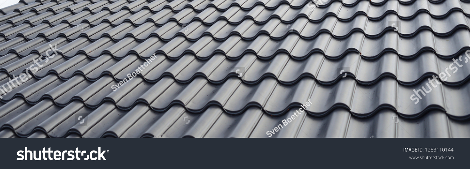 concept for roof housetop icon with grey roofing tiles. banner texture for roofers #1283110144