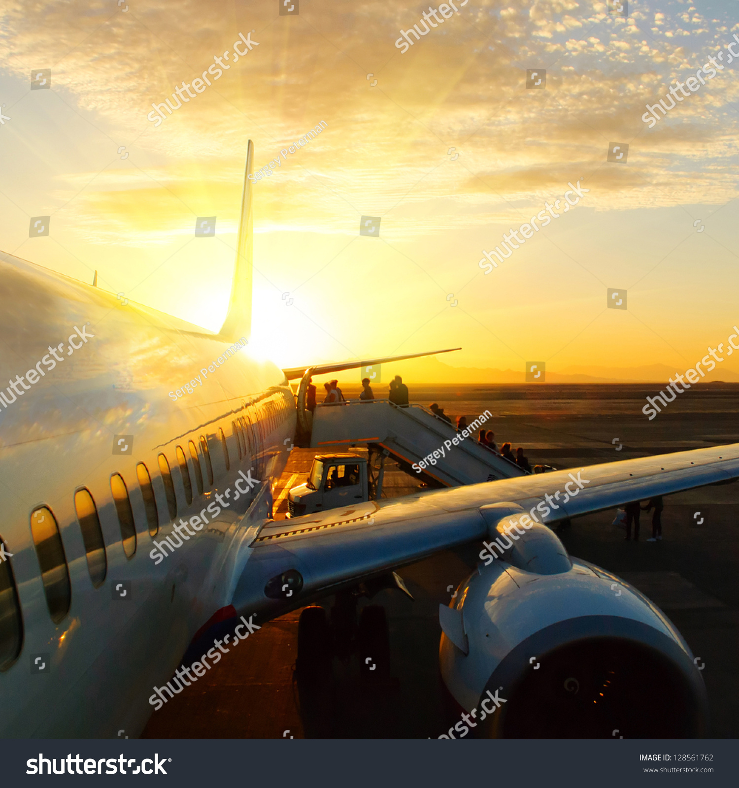 aircraft in airport at sunset #128561762