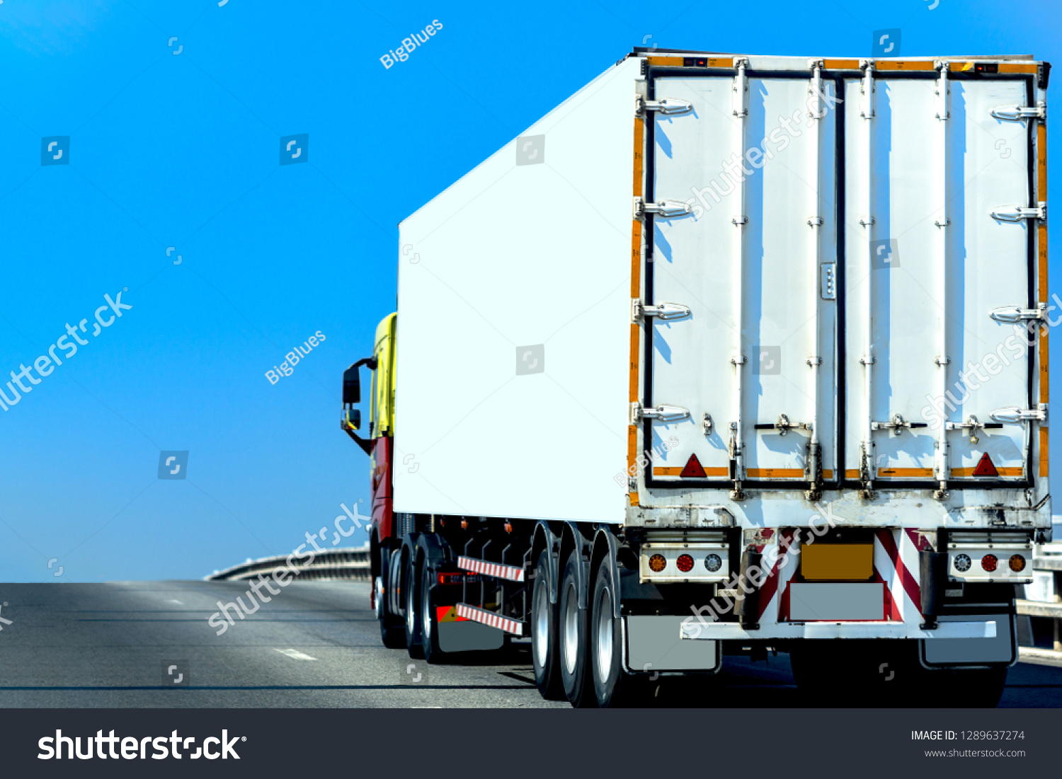White Truck on highway road with  container, transportation concept.,import,export logistic industrial Transporting Land transport on the asphalt expressway With the blue sky #1289637274
