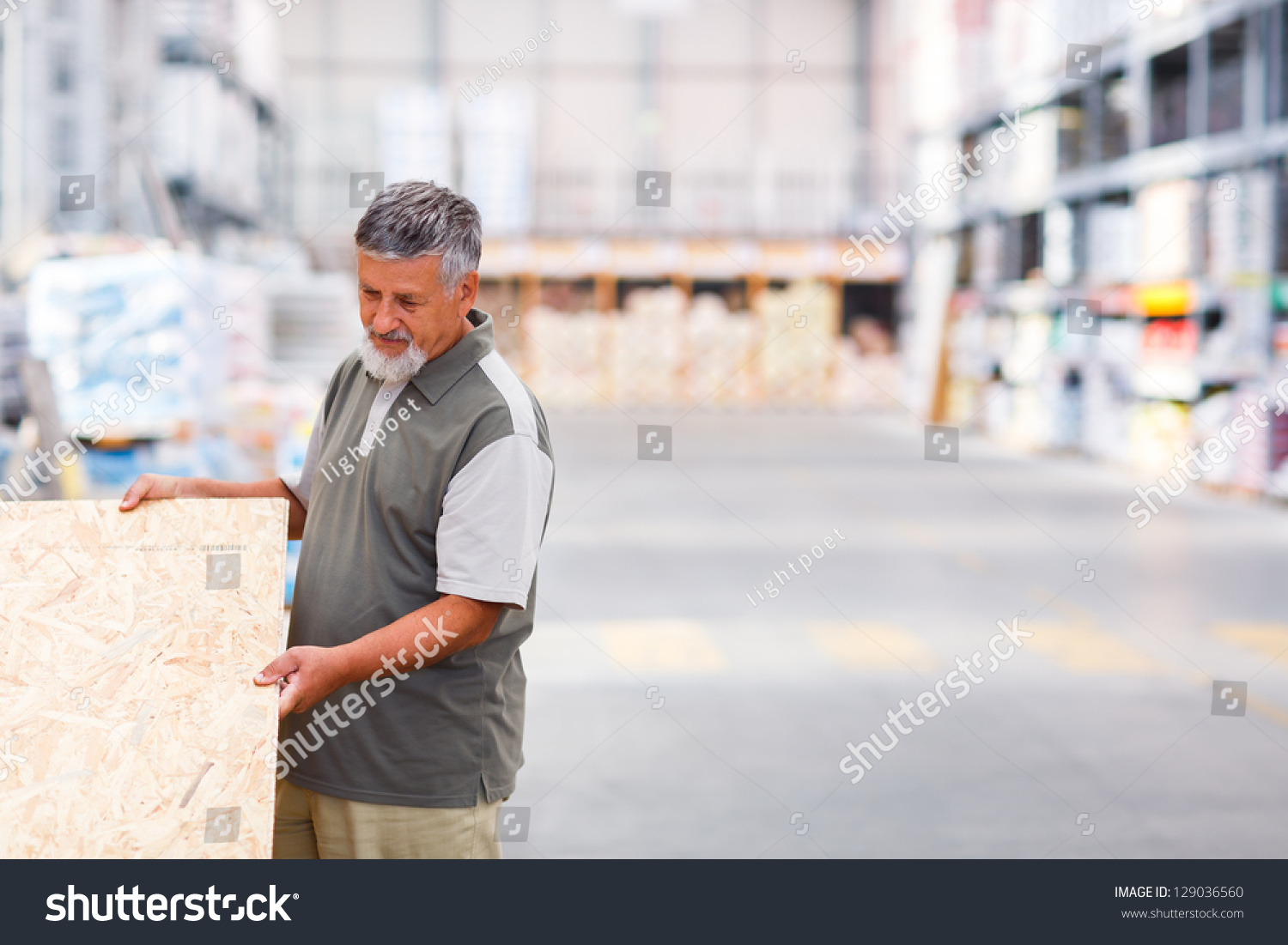Senior man buying construction wood in a  DIY store #129036560