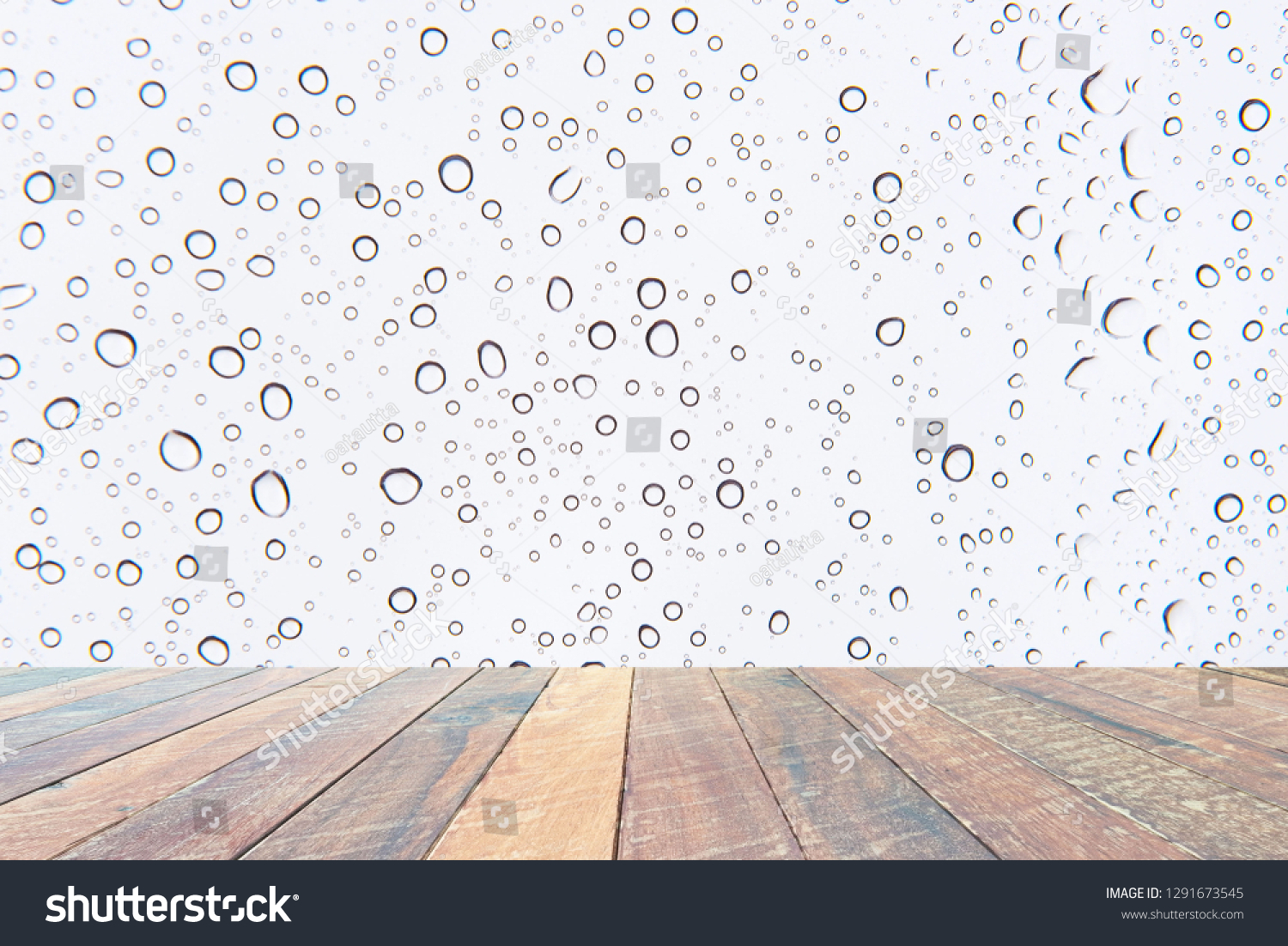 Water drops , Rain droplets on white background and empty wood desk .Blank space for text and images. #1291673545