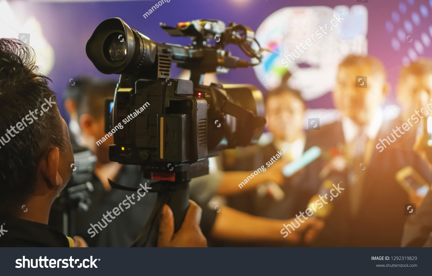 cameraman recording. videotaping microphone journalist journalist interviewing. live streaming concept. #1292319829