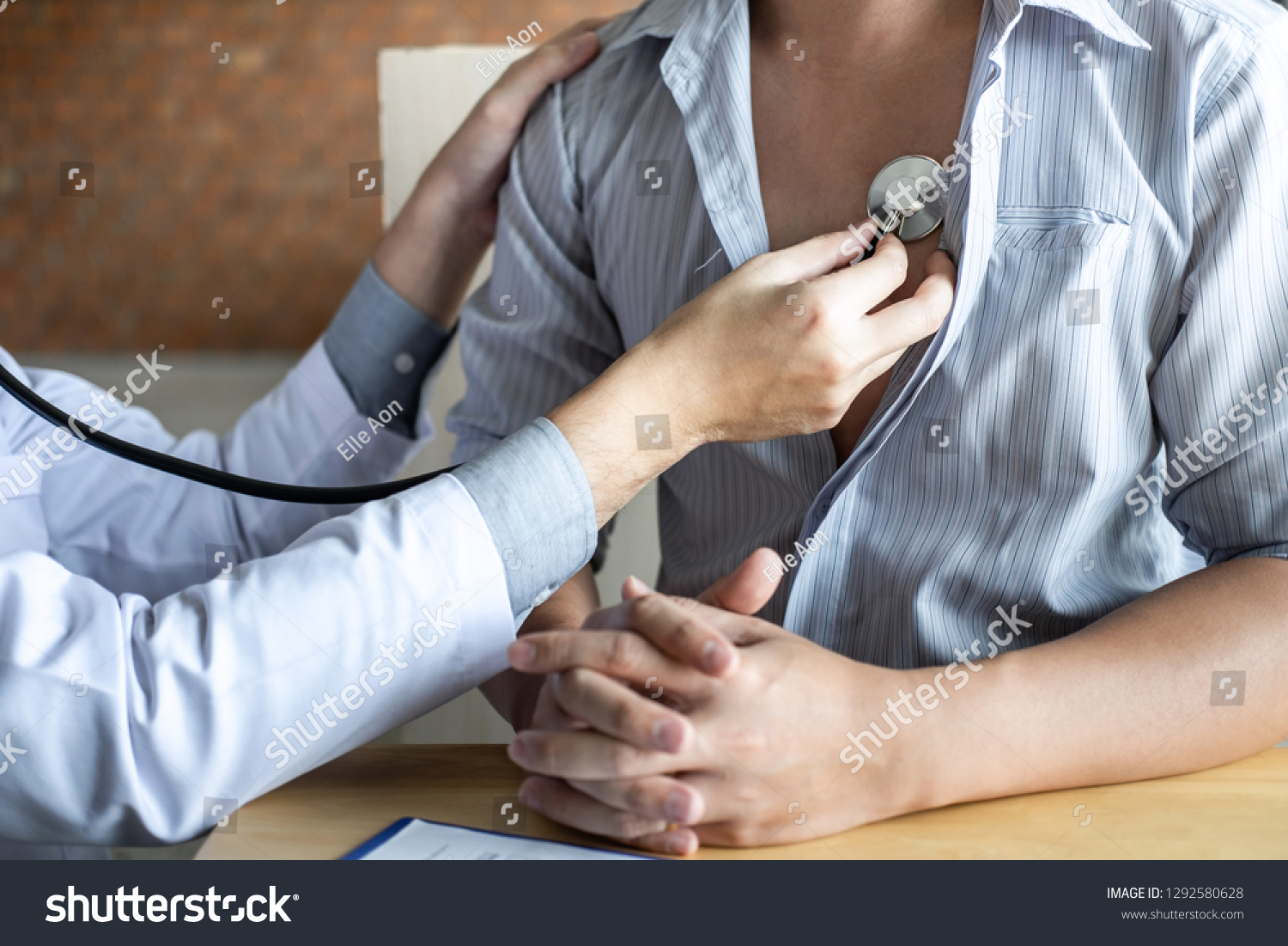Doctor using a stethoscope checking patient with examining, presenting results symptom and recommend treatment method, Healthcare and medical concept. #1292580628