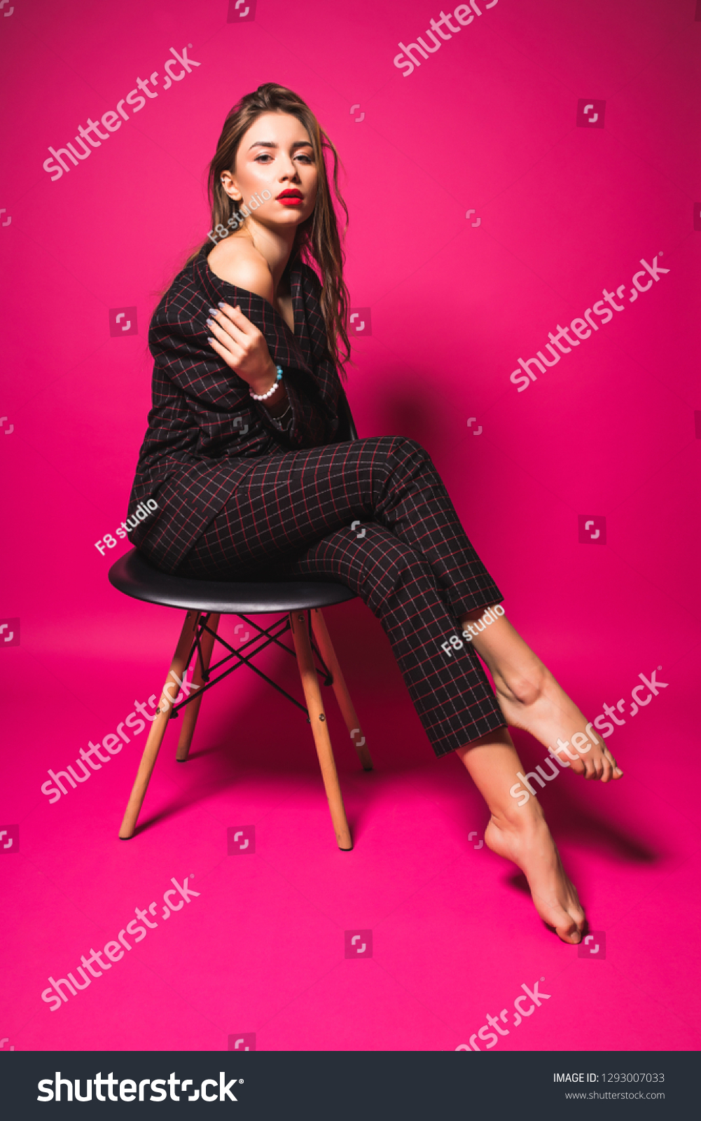 Fashion Model Style. Fashionable Woman In Stylish Clothes Posing On fashion Background In Studio. #1293007033