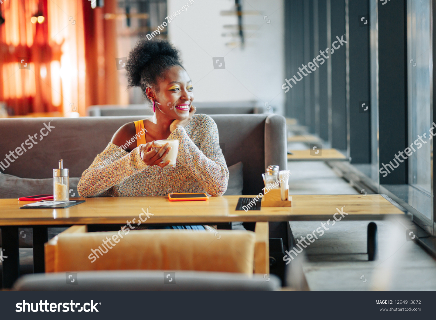 Beautiful girlfriend. Beautiful girlfriend drinking coffee while waiting for her man in restaurant #1294913872