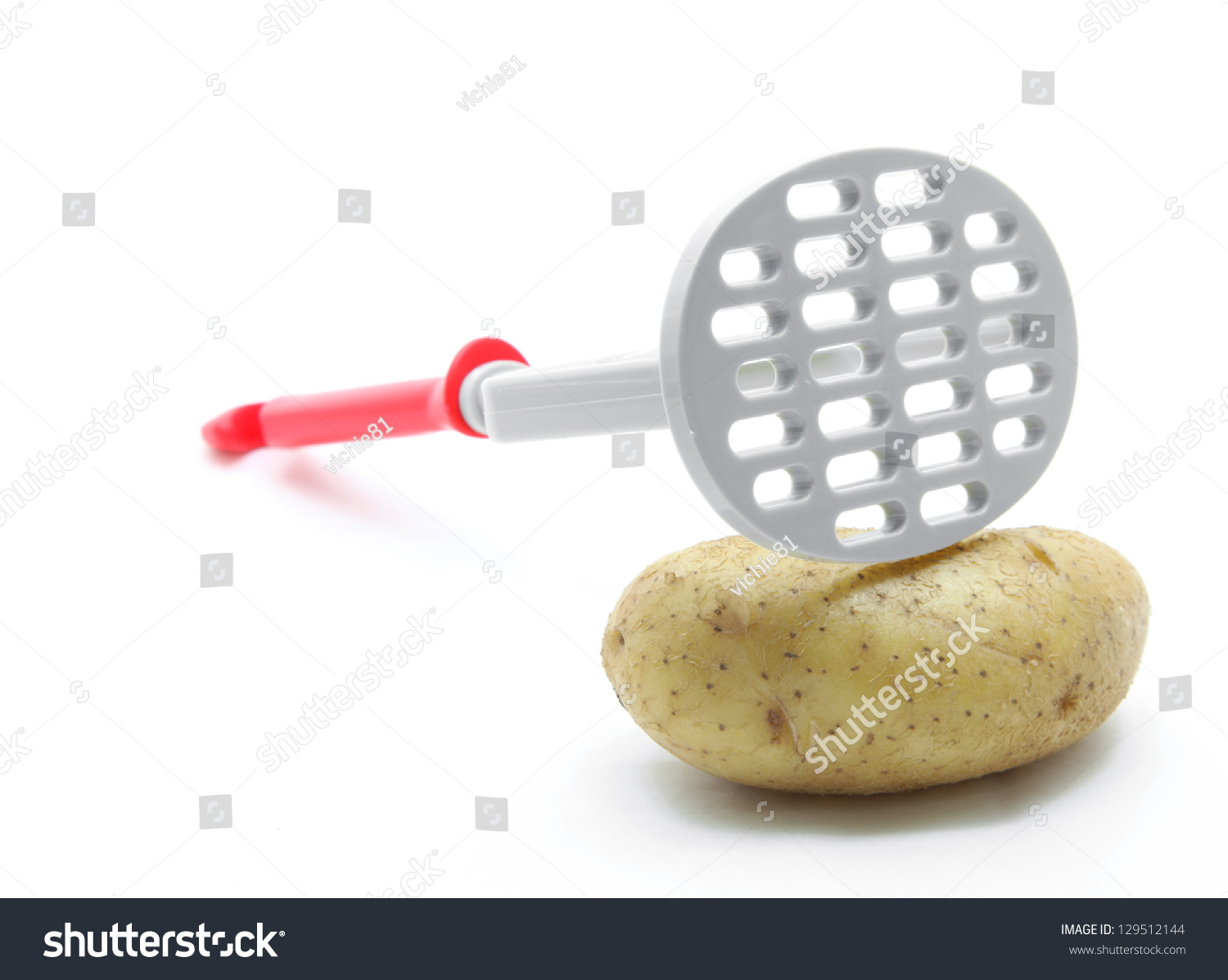 potato masher with raw potato isolated on white background #129512144