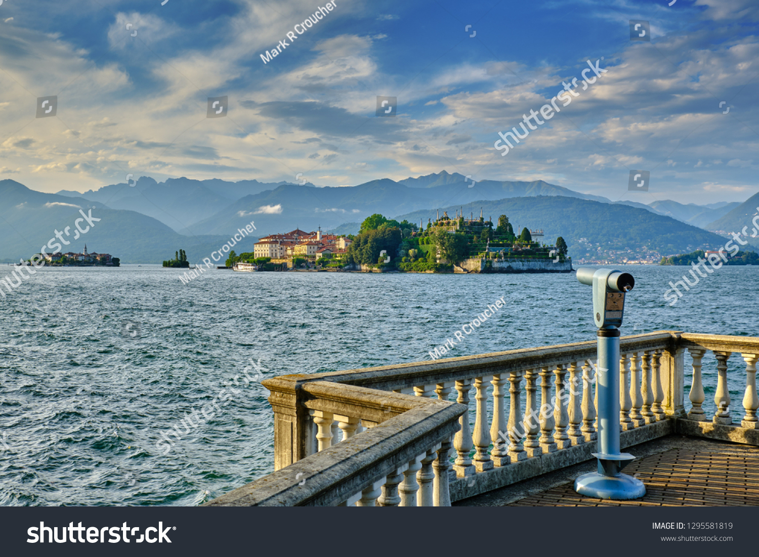 In Stresa Italy, on the shore of Lake Maggiore looking out over the Barromean islands in the evening light. #1295581819