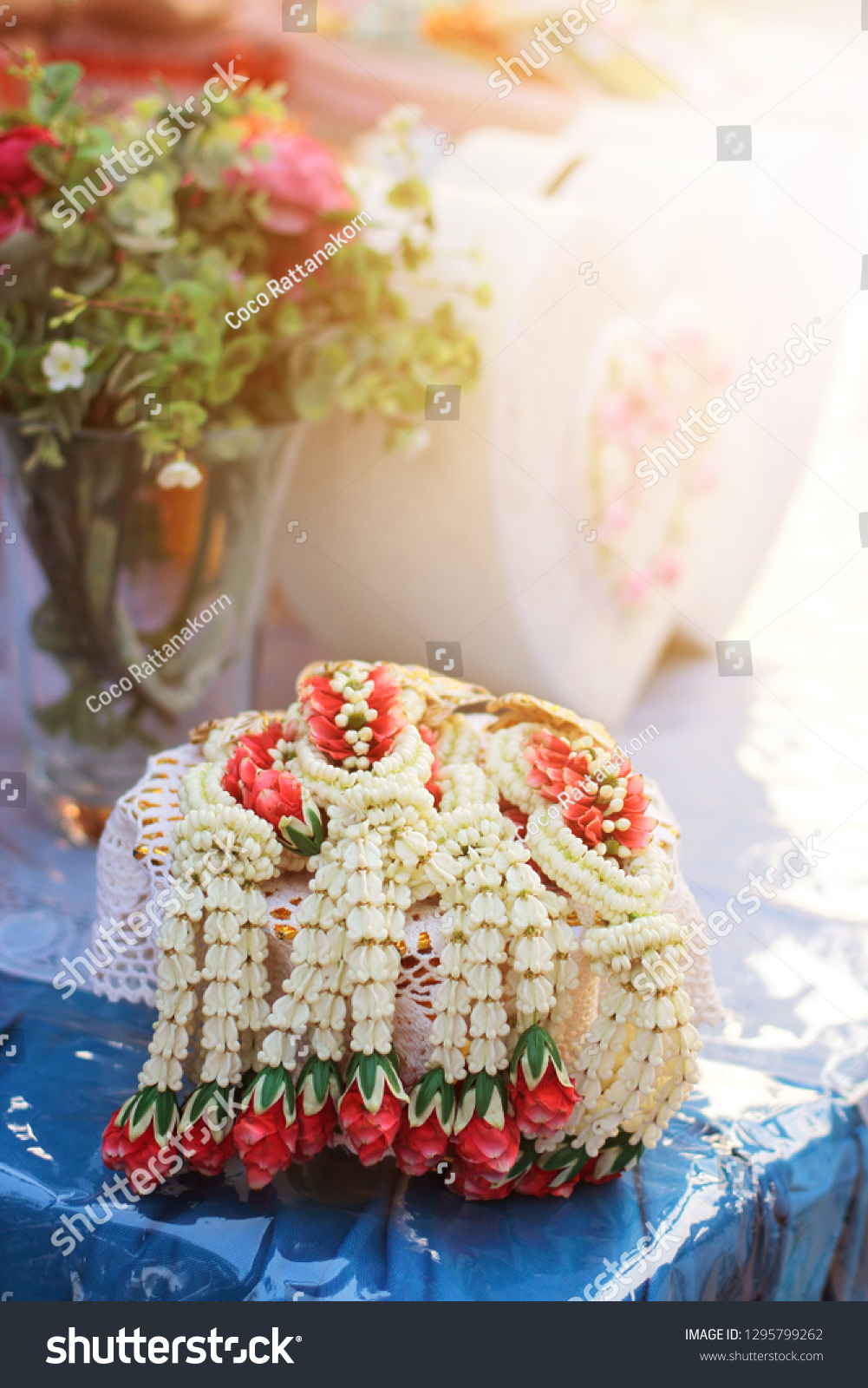 Flower garlands on a gold tray in tradition Thai wedding ceremony day. Jasmine garland. #1295799262