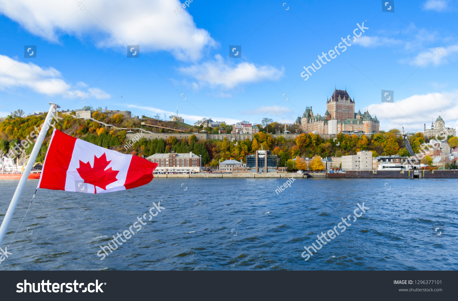 Panoramic autumn view of Old Quebec City waterfront and Upper Town from Saint-Lawrence River in Quebec, Canada #1296377101
