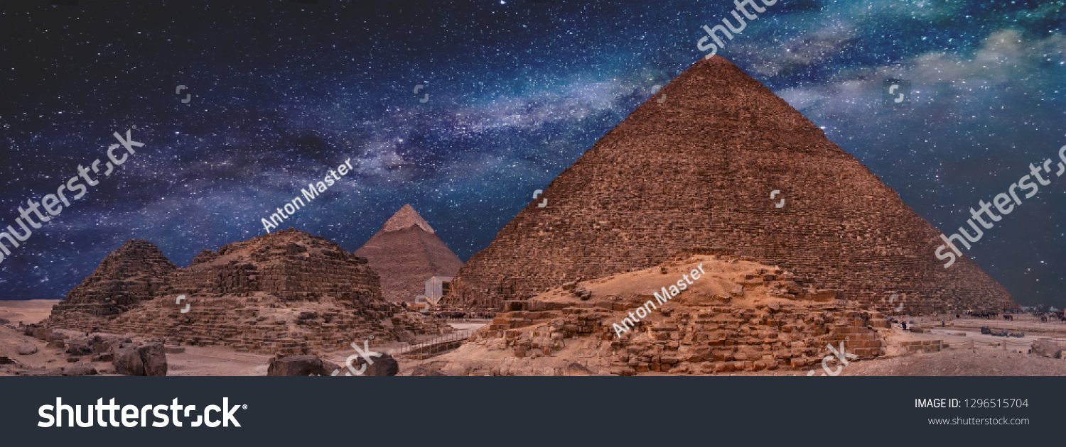 Night sky of the Milky Way over the great pyramids on the plateau of Giza, Egypt, Africa. #1296515704