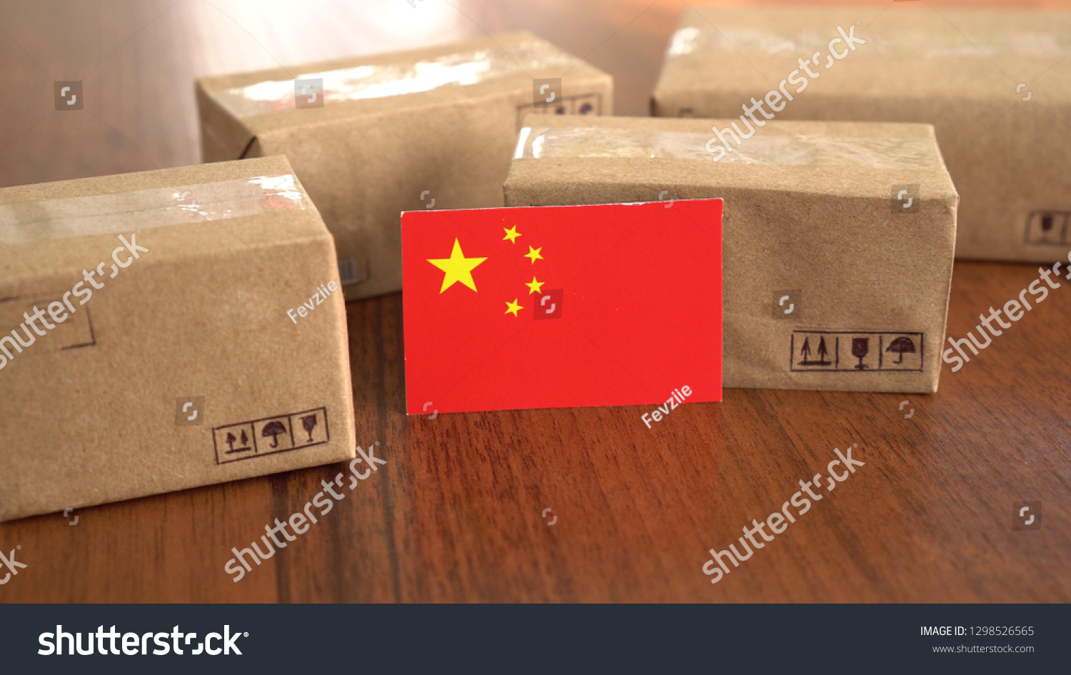 Package box with a flag of China. Online shopping. International E-commerce #1298526565