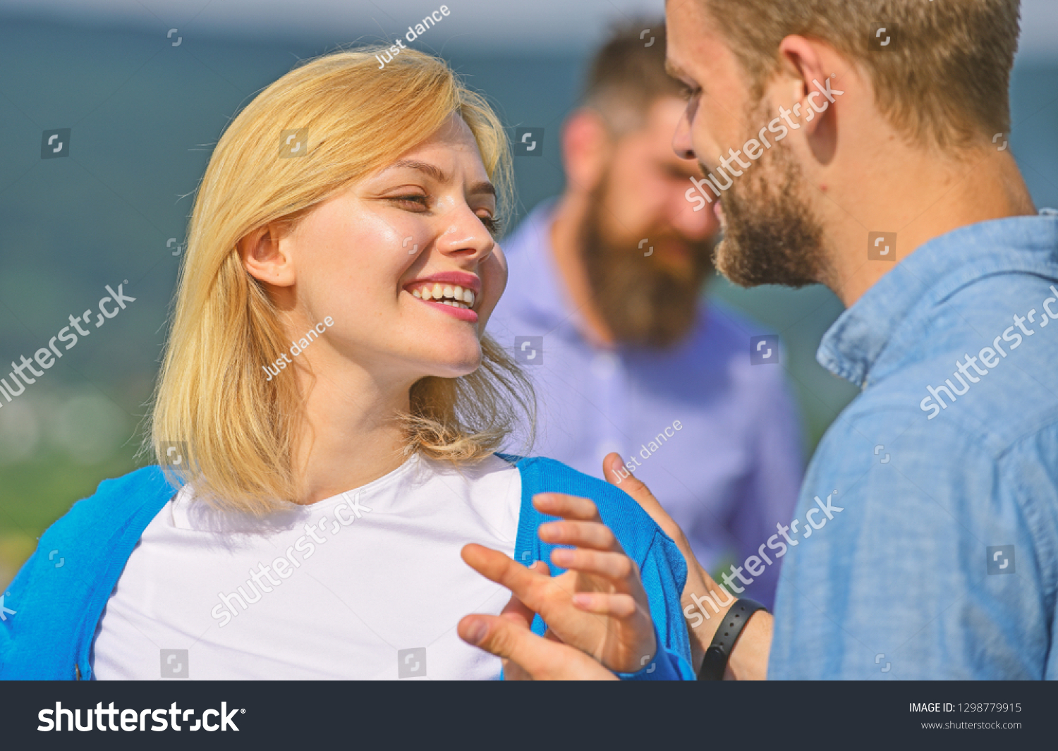 Couple in love happy dating, jealous bearded man watching wife cheating him with lover. Couple romantic date lovers flirting. Lovers meeting outdoor flirt romance relations. Jealous concept. #1298779915