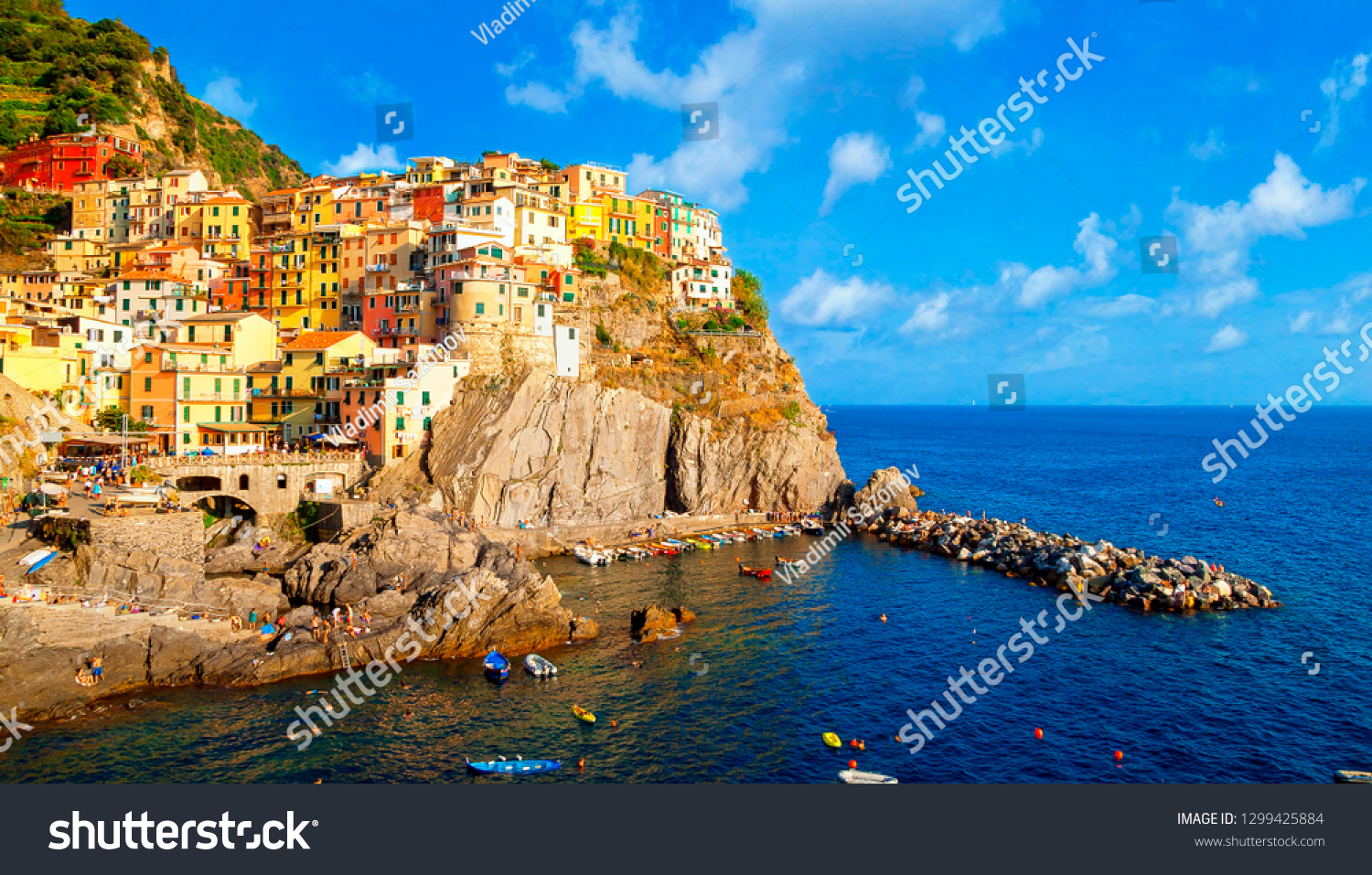 Panaramic view of Manarola, Cinque Terre coast in Italy, Europe. Is one of five famous colorful villages of Cinque Terre National Park in Italy. Architecture and landmark of Manarola and Italy. #1299425884