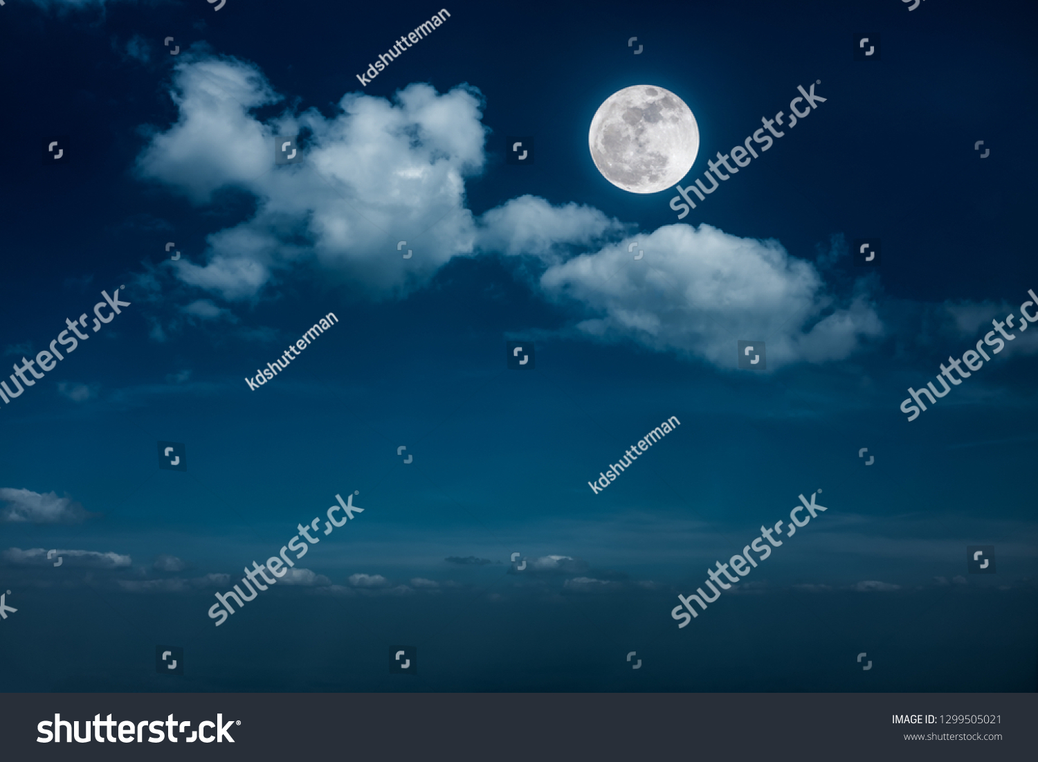 Beautiful skyscape. Landscape of night sky with clouds and bright full moon. Serenity nature background, outdoor at nighttime with moonlight. The moon taken with my own camera. #1299505021