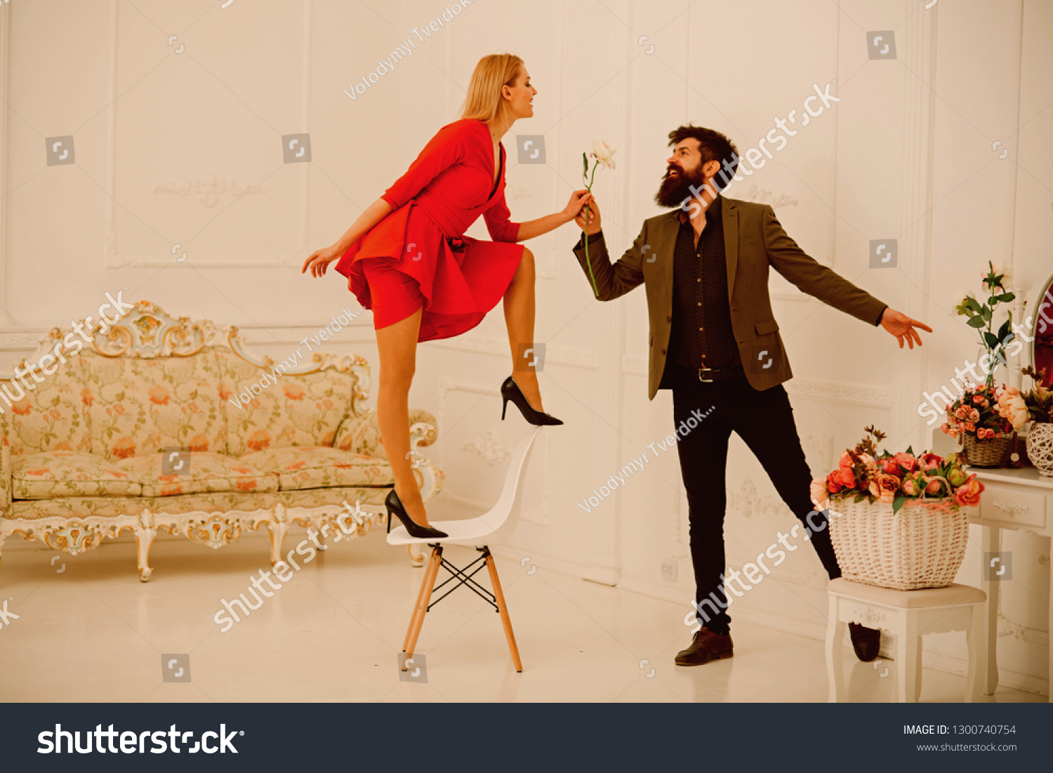 Romance concept. Sensual couple enjoy romance. Bearded man give rose to sexy woman, romance. You are my romance. #1300740754