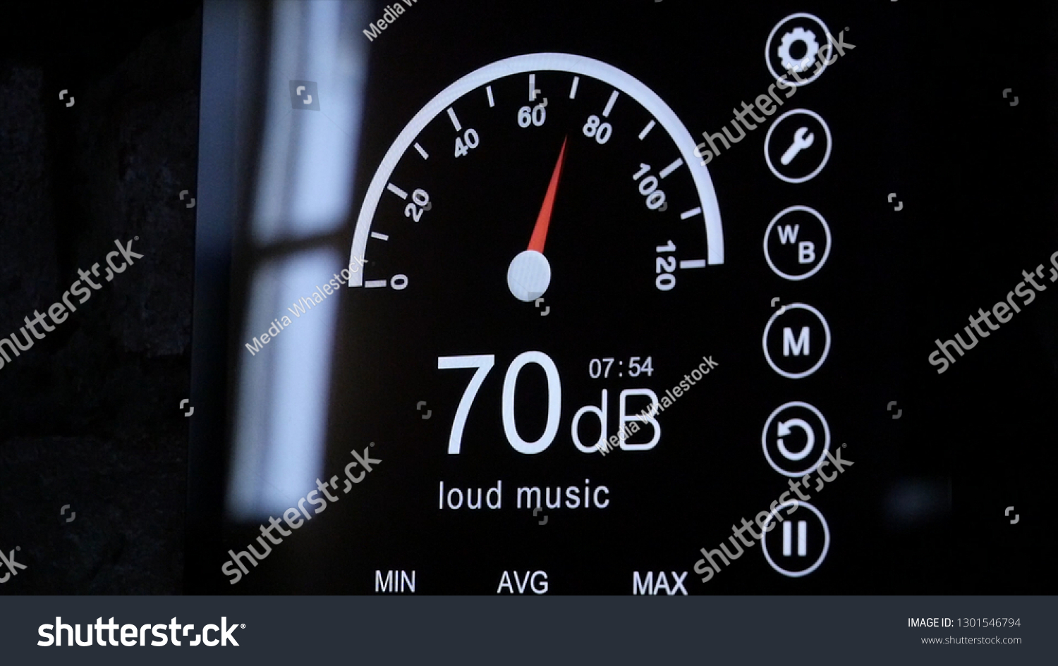 Close-up of sound level meter screen in decibels. Modern electronic sound meter around #1301546794