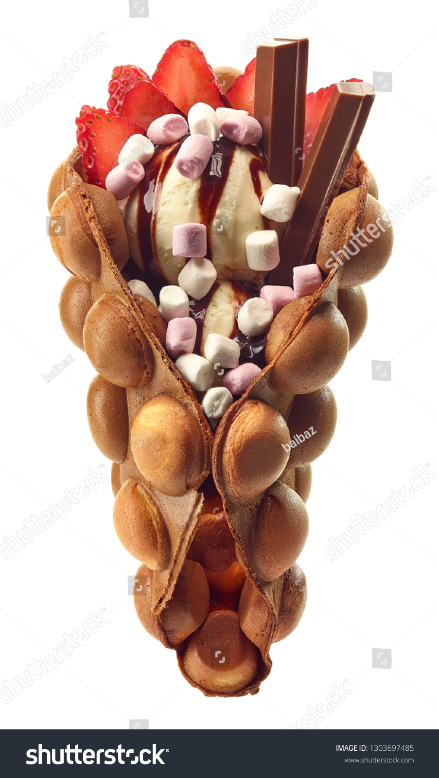 Hong kong or bubble waffle with ice cream, chocolate, marshmallows and strawberries isolated on white background #1303697485