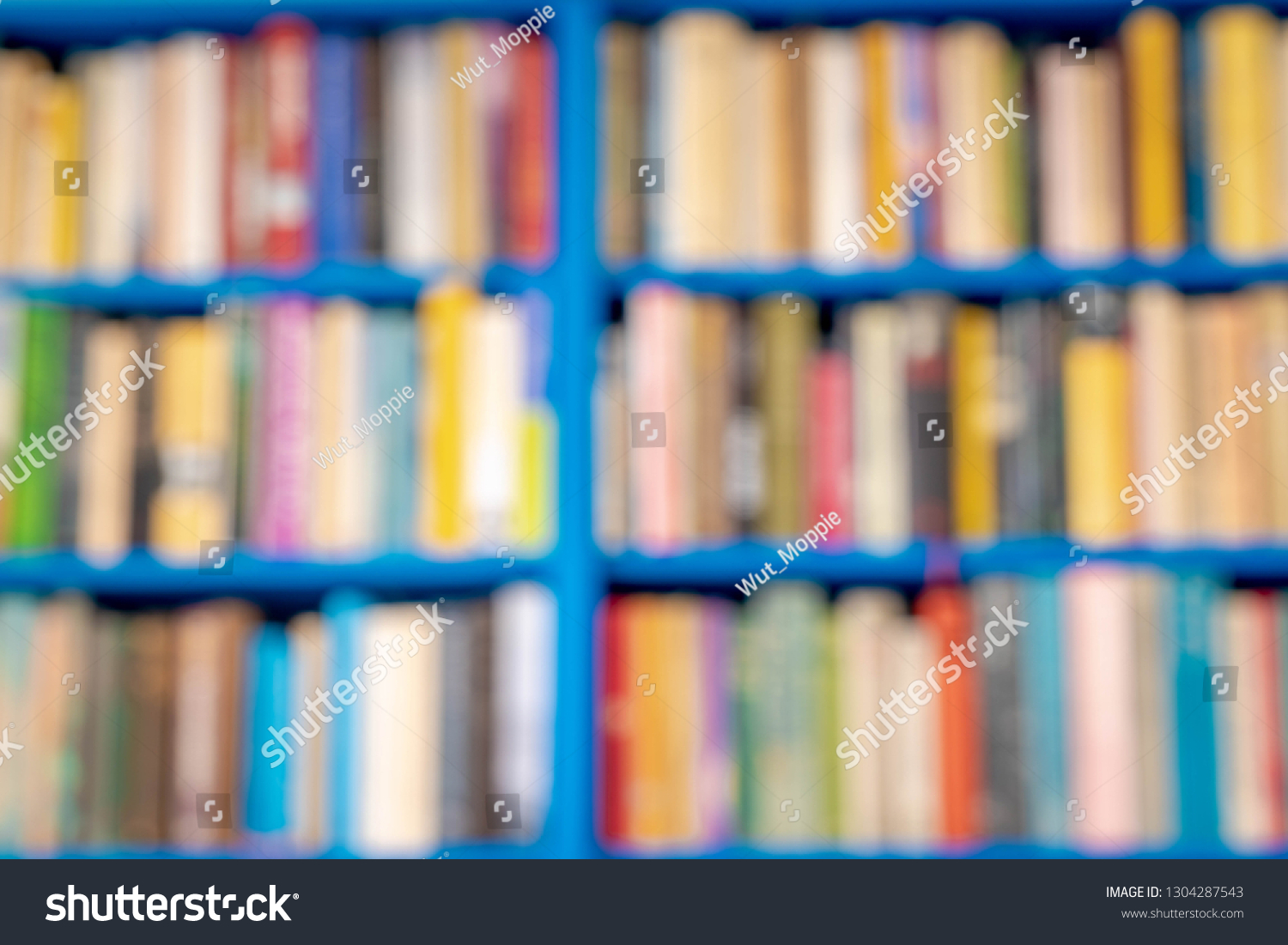 Education concept, Abstract blurred bookshelf, Blur bookshelves background, Books texture, Bookshelf background. #1304287543