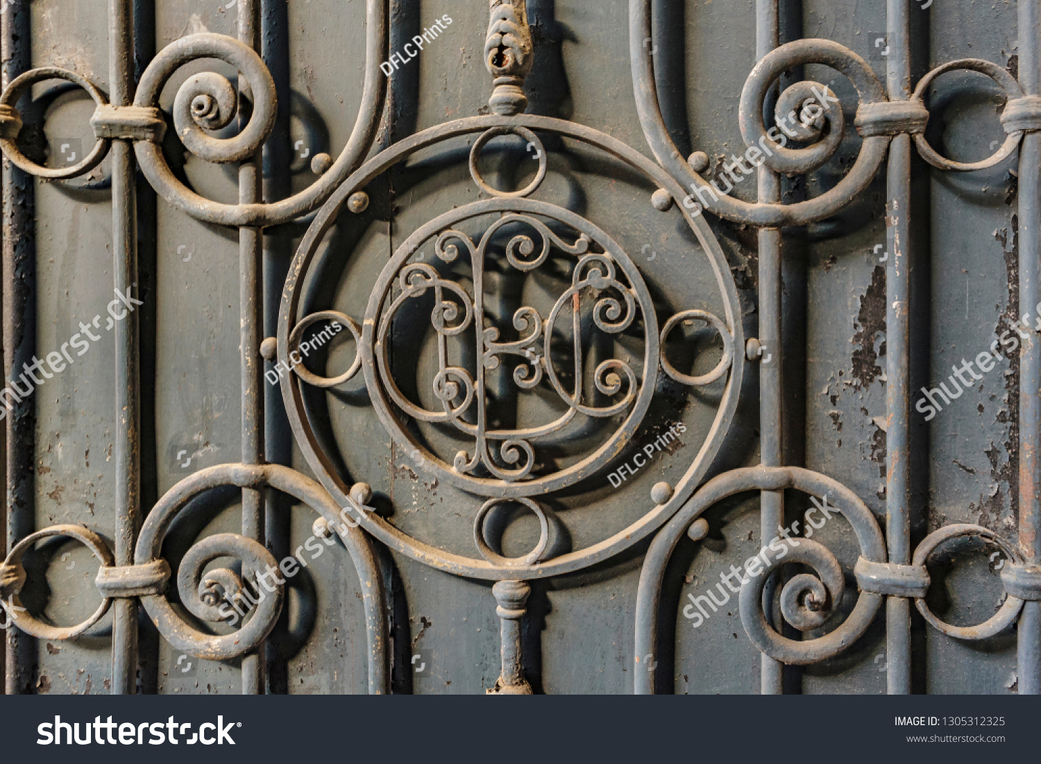 Iron ornate door detail background photo #1305312325