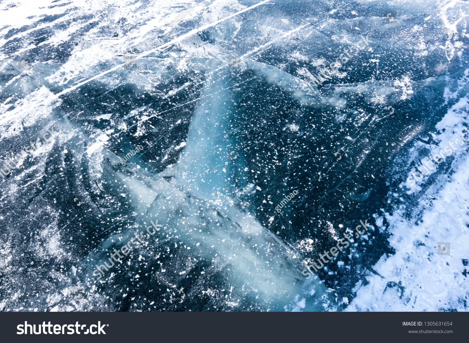 Ice of Lake Baikal, the deepest and largest freshwater lake by volume in the world, located in southern Siberia, Russia #1305631654