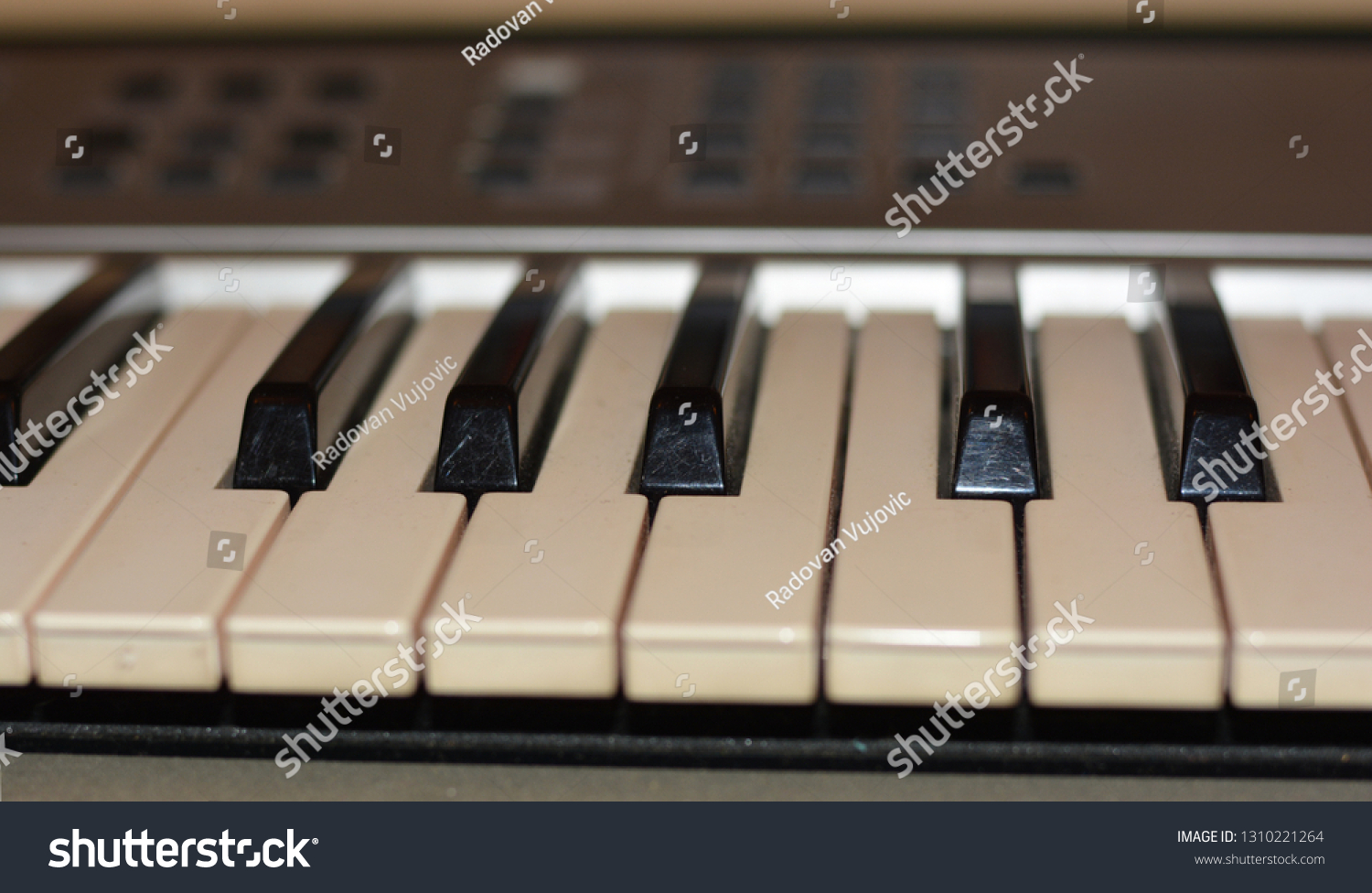 a few keys of electric music keyboards instrument #1310221264