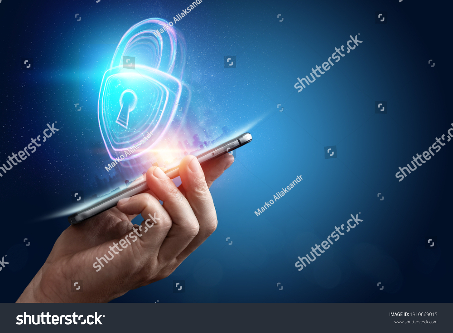 Creative, ultraviolet background, male hand and hologram lock. The concept of security, safe, data privacy, data protection, cryptocurrency, cyber otak. Mixed media. #1310669015