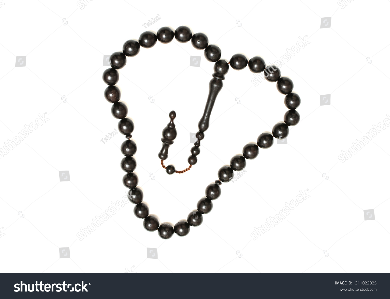 Heart shape of Muslim wooden prayer beads (rosary beads) isolated on white background. #1311022025