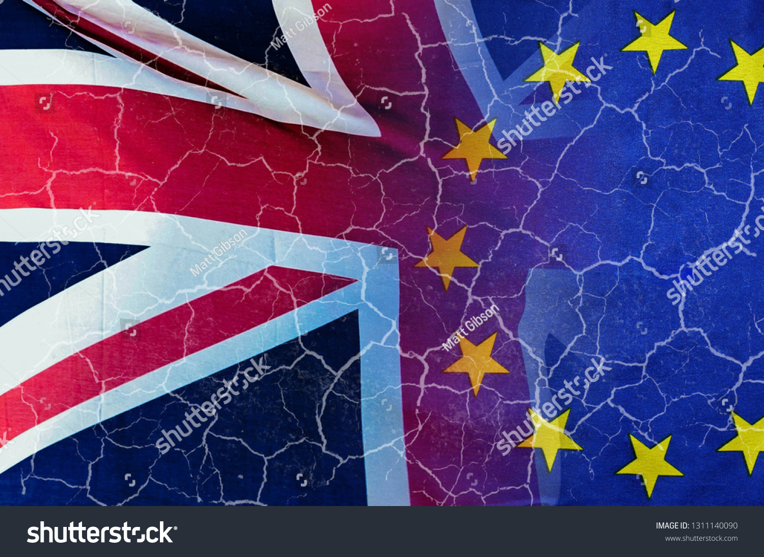No Deal Brexit concept image of cracks over image of London with UK and EU flags in image #1311140090