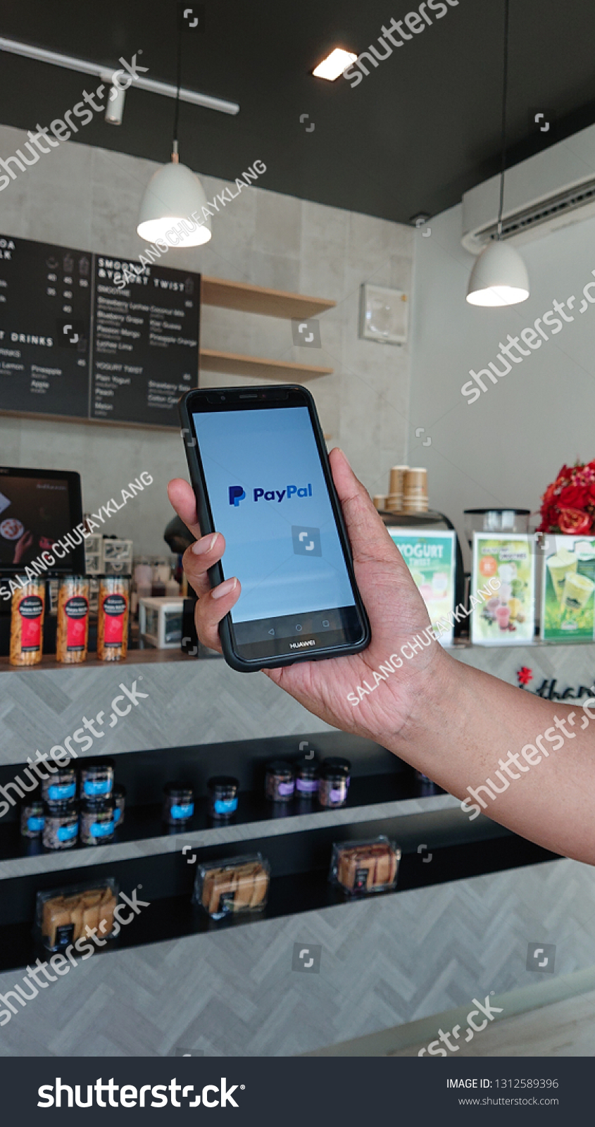 Khon kaen, Thailand - February 14 2019, HUAWEI smartphone showing Paypal application business daily information. #1312589396