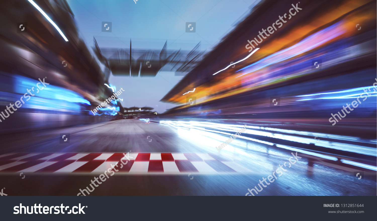 Motion blurred racetrack with start or end line and  lighting effect apply . #1312851644