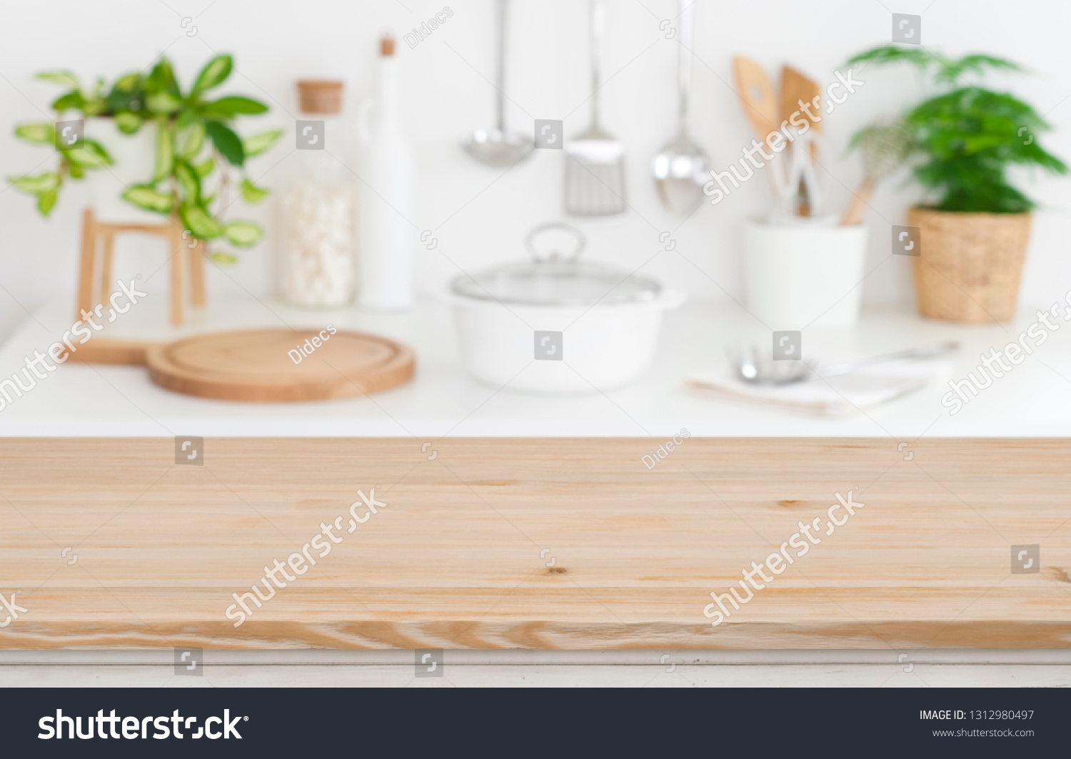Wooden table top on blurred kitchen counter background #1312980497