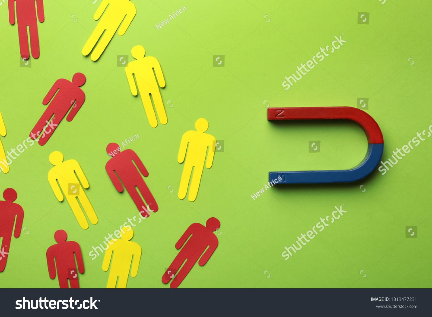 Magnet attracting paper people on color background, flat lay. Marketing concept #1313477231