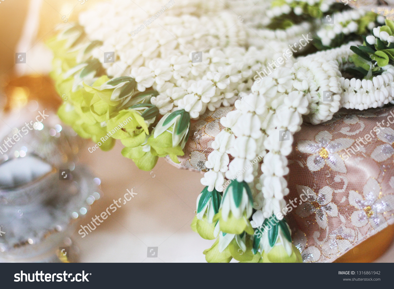 Flower garlands on a gold tray in tradition Thai wedding ceremony day. Jasmine garland #1316861942