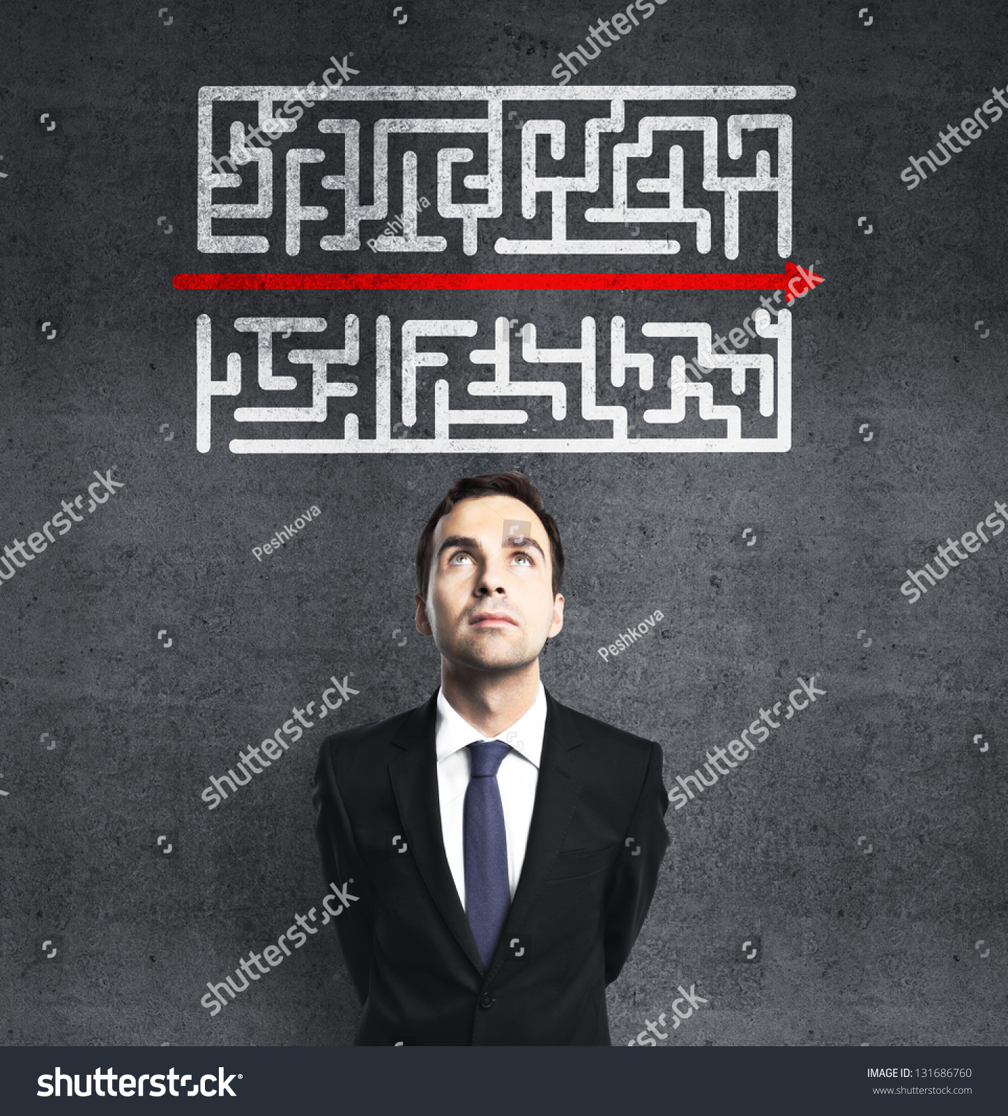 businessman looking at maze with red arrow #131686760